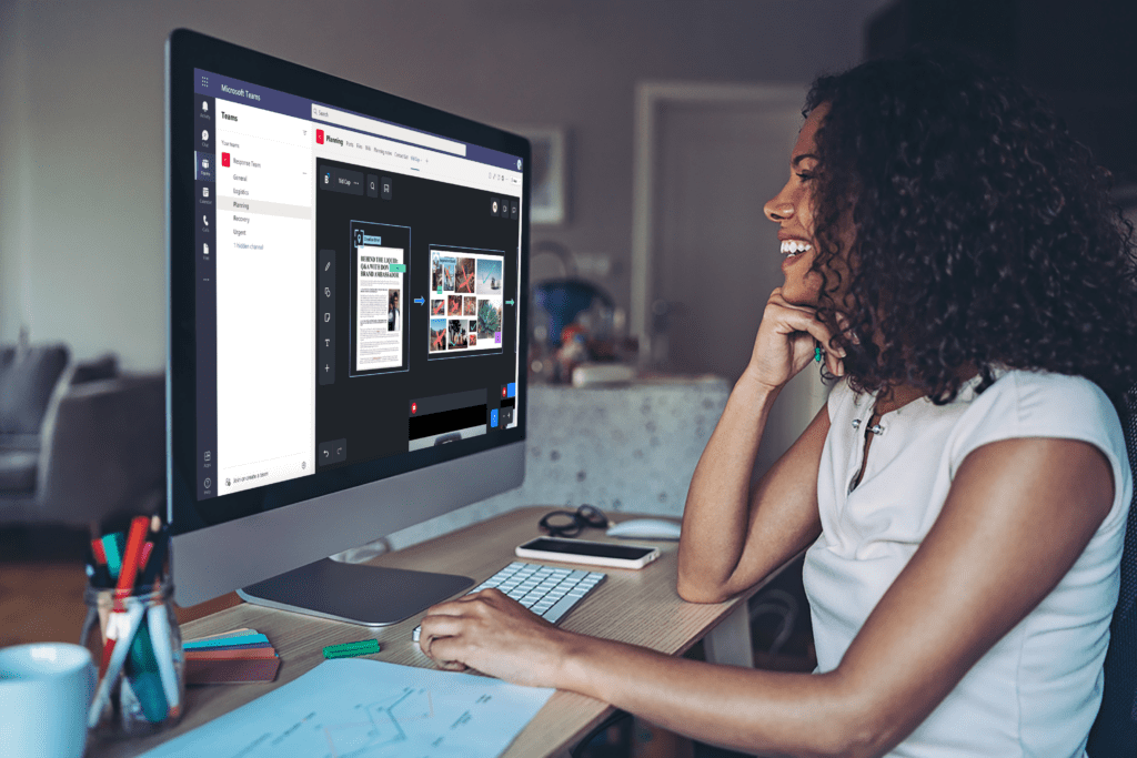 Bluescape Team - Woman smiling while working