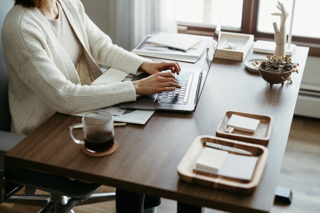 Woman working on ergonomic table