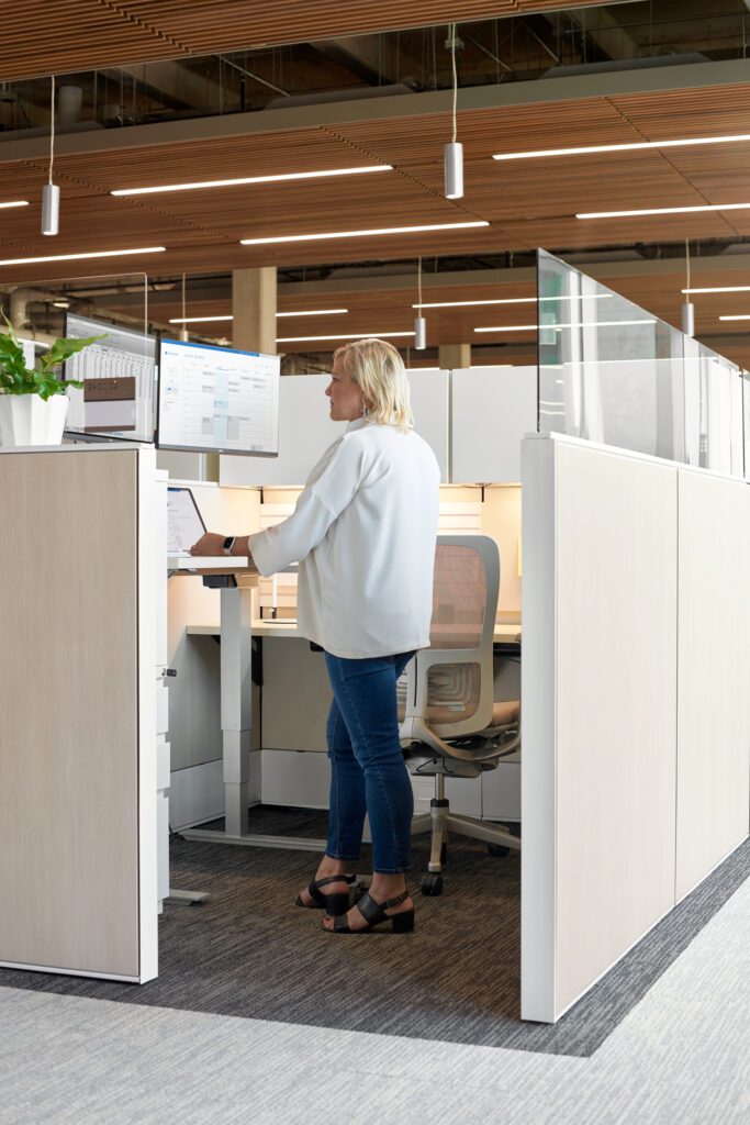 Woman standing while working